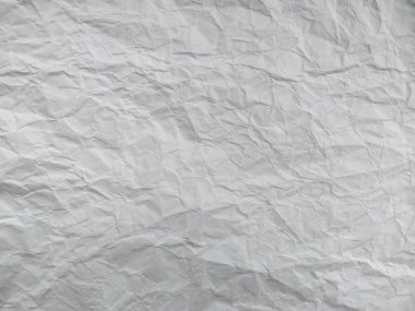 Buruşmuş kağıt dokusu. Arka plan için beyaz buruşmuş kağıt dokusu. Yırtık kağıt ya da buruşuk kağıt topu beyaz arkaplanda izole