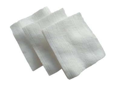 Beyaz arka planda beyaz pamuk. Pamuk iplik dokusu arka plan, beyaz kabarık doğal malzeme.