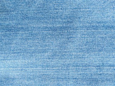 Denim kot kumaşı. Tasarım için Denim arkaplan dokusu. Kumaş kumaş. Arka plan olarak kullanılabilen mavi kot. Herhangi bir arkaplan için mavi kot dokusu