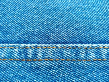 Denim kot kumaşı. Tasarım için Denim arkaplan dokusu. Kumaş kumaş. Arka plan olarak kullanılabilen mavi kot. Herhangi bir arkaplan için mavi kot dokusu