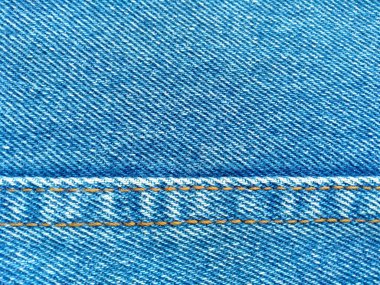 Denim kot kumaşı. Tasarım için Denim arkaplan dokusu. Kumaş kumaş. Arka plan olarak kullanılabilen mavi kot. Herhangi bir arkaplan için mavi kot dokusu
