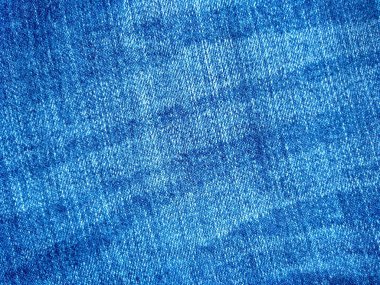 Denim kot kumaşı. Tasarım için Denim arkaplan dokusu. Kumaş kumaş. Arka plan olarak kullanılabilen mavi kot. Herhangi bir arkaplan için mavi kot dokusu