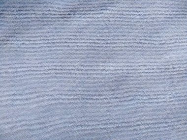 Denim kot kumaşı. Tasarım için Denim arkaplan dokusu. Kumaş kumaş. Arka plan olarak kullanılabilen mavi kot. Herhangi bir arkaplan için mavi kot dokusu