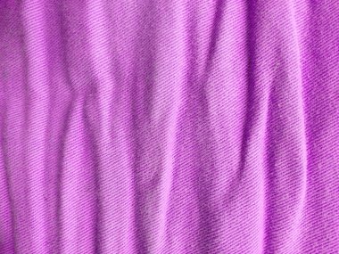 Denim kot kumaşı. Tasarım için Denim arkaplan dokusu. Kumaş kumaş. Pembe kot arka plan olarak kullanılabilir. Herhangi bir arkaplan için pembe kot dokusu