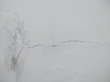 Kirli ve eski beton duvar dokusu. Eskimiş paslı metal soyut dokusu. Soyulmuş boyayla Grunge arkaplanı (Duvar dokusu duvar çerçevesi ve duvar arkaplanı olarak kullanılabilir) )