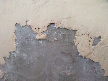 Kirli ve eski beton duvar dokusu. Eskimiş paslı metal soyut dokusu. Soyulmuş boyayla Grunge arkaplanı (Duvar dokusu duvar çerçevesi ve duvar arkaplanı olarak kullanılabilir) )