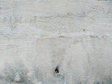Kirli ve eski kumtaşı duvar dokusu. Yosun, gözenekli, çatlak ve yıpranmış kumtaşı duvarların soyut dokusu. (Duvar dokusu duvar çerçevesi ve duvar arkaplanı olarak kullanılabilir )