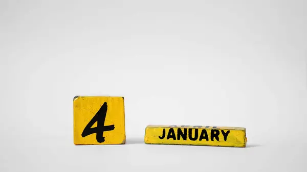 4 Ocak Tahta Takvim. Dünya Braille Günü. Metnin için boşluk olan beyaz arkaplan.