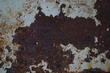 Paslanmış demir ve soyulmuş boya. Tasarım malzemesi olarak kullanılabilir