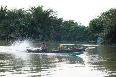 A boat on the Martapura River Banjarmasin, South Kalimantan, Indonesia clipart