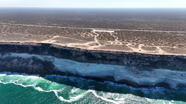 An aerial view of the flat lands of the Nullarbor and the cliffs Great Australian Bight clipart