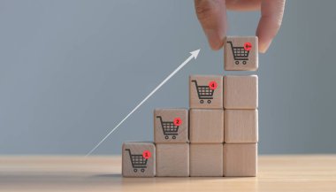 Ticari büyüme konsepti grafiği büyüyen satış eğilimi ve çevrimiçi satış için daha büyük alışveriş arabası