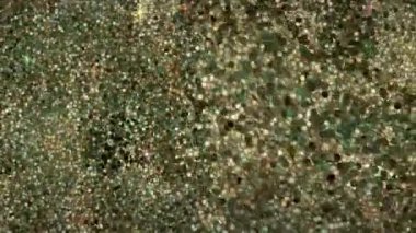 Küçük top akışları şeklinde soyut canlandırılmış arkaplan.