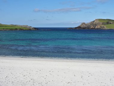 Minn beach, or Bannaminn beach, a stunning tombolo in the Shetland islands. Blue sky, turquoise water and white sand. Shetland Islands. Scotland clipart