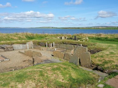 Neolithic Barnhouse Settlement. Orkney islands. Scotland. The Neolithic Barnhouse Settlement is not far from the Standing Stones of Stenness. This small village is part of the UNESCO World Heritage Site.  clipart