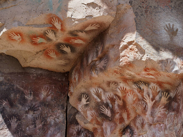 Cueva de los Manos or Cave of the Hands in Patagonia. It is a cave and complex of rock art sites in the province of Santa Cruz, Argentina. The cave is named for the hundreds of paintings of hands.