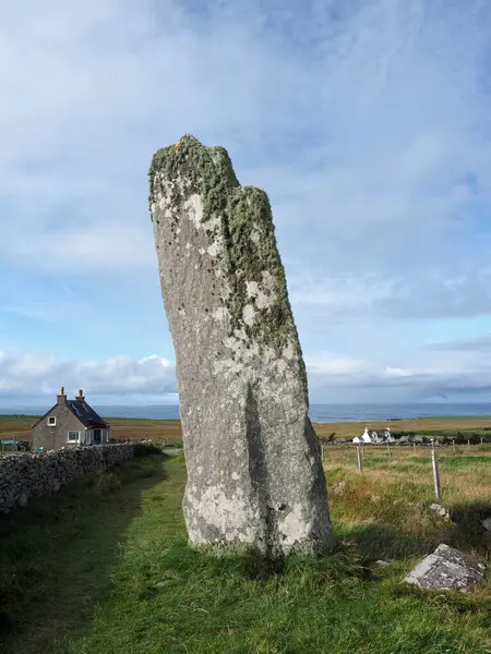 stock image Clach an Trushal (or Clach an Truiseil in Gaelic). Tallest standing stone in Scotland with 19 feet high (6m). The stone is sited in the village of Ballantrushal, Lewis Island. Outer Hebrides. 