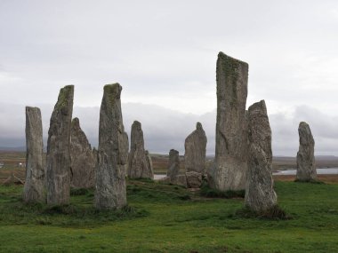 Callanish or Calanais Standing Stones. Isle of Lewis, Scotland. This is a cruciform shaped stone circle, erected 5000 years. It is one of Scotlands most magnificent and preserved Neolithic monuments. clipart
