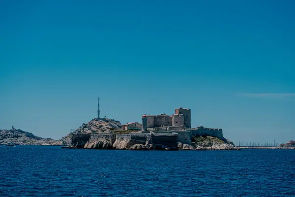 stock image Historic island fortress in the blue waters near Marseille.
