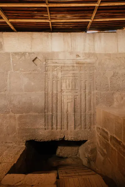stock image Carved doorway in Giza, entrance to ancient tomb.