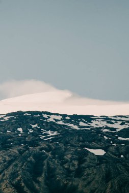 Close-up of rugged volcanic textures on Snaefellsjokull in Snaefellsnes, West Iceland clipart