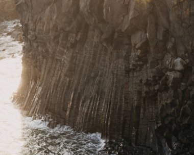 Rugged coastal cliffs and crashing waves at Arnarstapi, Snaefellsnes Peninsula, West Iceland clipart