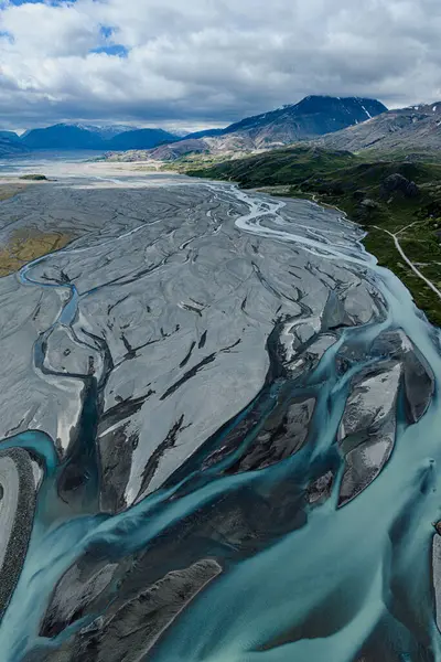 Örgülü buzul nehirleri Hvannagil, İzlanda yakınlarındaki Jokulsasandur 'dan esiyor.