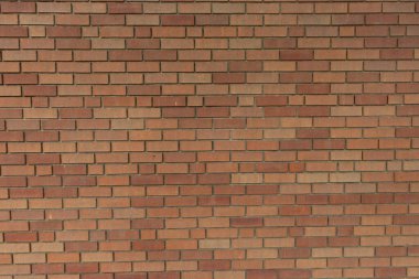 Sarı ve turuncu renkli tuğla duvar. Büyük Kırmızı Tuğla Duvar Arkaplanı. Klasik Tuğla Duvar dokusu. Panoramik Web afişi ya da Kopya Alanı olan Duvar Kağıdı. Kırmızı tuğlalı arka plan. Büyük Kırmızı Tuğla Duvarı Arkaplanı.