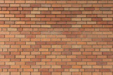 Tuğla Arkaplan Çağdaş Turuncu ve kırmızı tuğla duvar dokusu. Çağdaş turuncu ve kırmızı tuğla duvar dokusu. Panoramik Web afişi ya da Kopya Alanı olan Duvar Kağıdı. Kırmızı tuğlalı arka plan. Büyük Kırmızı Tuğla Duvarı Arkaplanı.