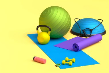 Yoga minderi, kettlebell, fitness topu ve sarı arka plandaki akıllı saatler gibi spor malzemelerinin farklı bir görüntüsü. Güç kaldırma ve zindelik kavramının 3 boyutlu canlandırması