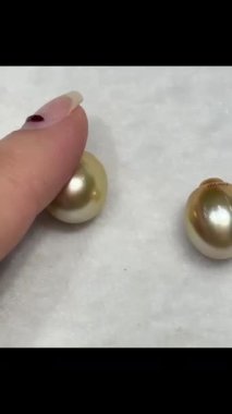 Zarif Parmak Dokunma Yüzeyine sahip Zarif İncilerin Yakın Çekimi