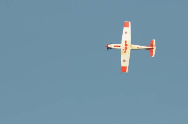 NAKHON PATHOM, THAILAND - January 14, 2023 : stunt flying, Pilatus PC-9 flying pass above venue of national children day at Kamphaeng Saen Aviation School