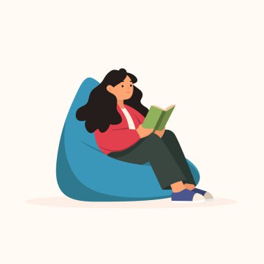 Koltukta, dizüstü bilgisayar kullanan kadın