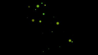 Siyah arkaplanda yeşil parıltılı ışıklar izole