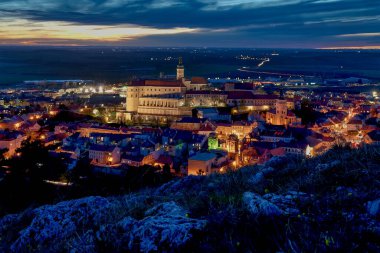 A view of Mikulov at night from the Holy Hill, dramatic sky clipart