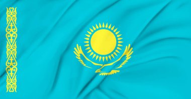 Kazakistan bayrağı havada dalgalanıyor.