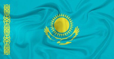 Kazakistan bayrağı havada dalgalanıyor.