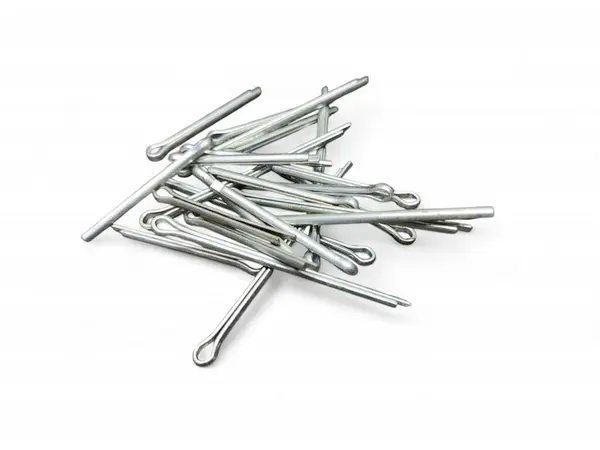 stock image Pile of Cotter pins, or split pins, to secure clevis pins and other parts isolated on white background