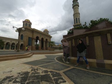 Samarinda-East Kalimantan January 2nd,2020  Baitul Muttaqien Mosque, magnificent mosque, famous mosque, the largest mosque and Islamic center in Samarinda clipart