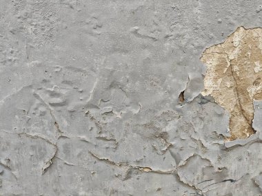Duvarın arka planında beton desenli çatlak boyası olan gri ışık..