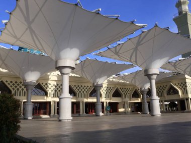 Balikpapan-east Kalimantan November 02,2024  Madinatul Iman Mosque or Balikpapan Islamic Center Mosque with Middle Eastern style dome and tower architecture at Balikpapan-east kalimantan clipart