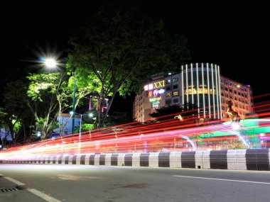 Balikpapan-east Kalimantan November 02,2024 A night time , long exposure view light trails in the street from passing vehicles at balikpapan clipart