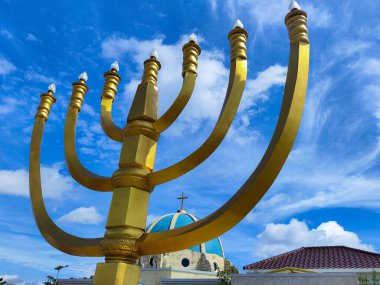 Balikpapan-Indonesia December 21,2024 Statue of Menorah candle at Bukit Doa Kalimantan, Balikpapan City, East Kalimantan - Indonesia clipart