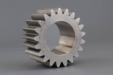 İzole edilmiş arka planda gezegen iletim sistemi, şanzımanın bir parçası veya başka bir mekanizm, endüstriyel arkaplan kavramı.