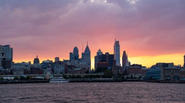 The beautiful Philadelphia City skyline at Sunset: Philadelphia, Pennsylvania - August 27, 2022. clipart