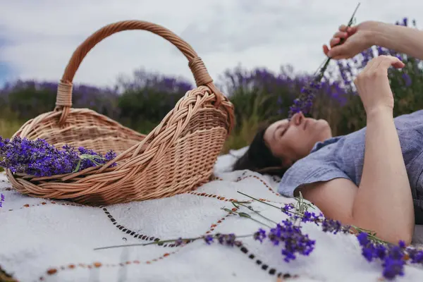 stock image Beautiful Young women in the lavender field. She is rests enjoing.High quality photo