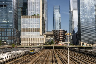 New York NY USA-June 19, 2024 Hudson Yards and the Amtrak West Side railyards clipart