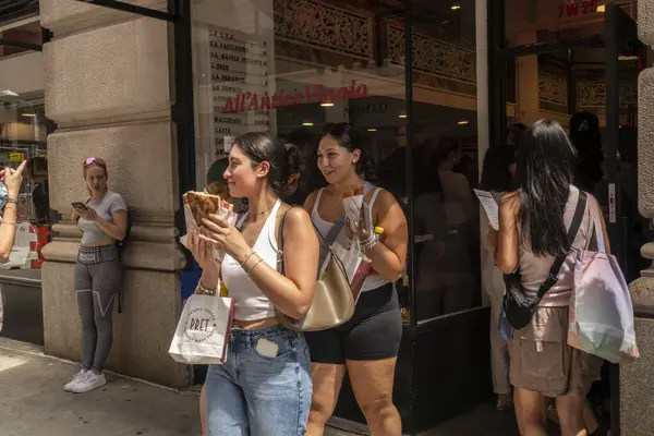 stock image New York NY USA June 26, 2024 Tommaso Mazzanti, center, with Joe Bastianich, left, at the grand opening of a branch of their Florentine sandwich shop AllAntico Vinaio