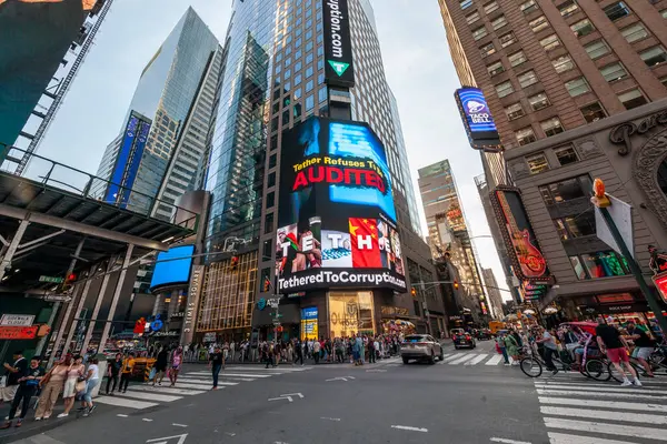 stock image New York NY USA-July 3, 2024 Advertising in Times Square accuses Tether cryptocurrency of being allegedly used in terrorism, the Chinese gov, Russia avoiding sanctions, and numerous improprieties