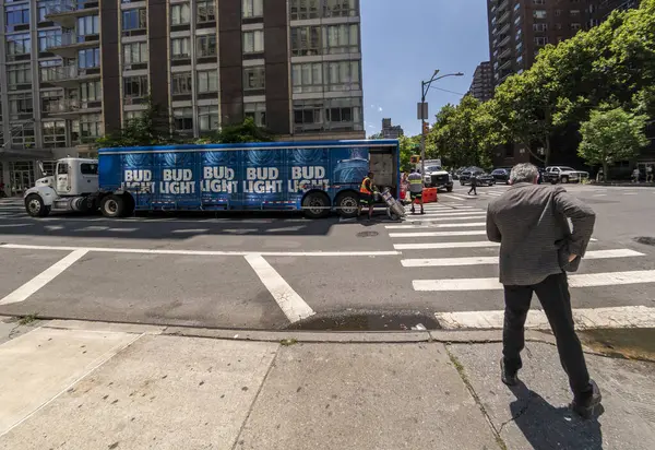 stock image New York NY USA-July 11, 2024 A delivery of Bud Light beer and other beverages in a Budweiser branded truck in Chelsea in New York